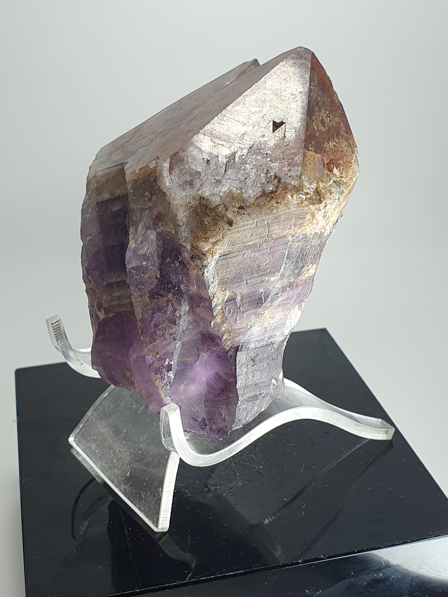 Twin terminated Amethyst Crystal with Red hematite and multiple Trigonic Record Keepers (#19)